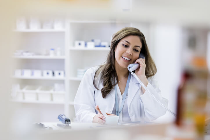 woman pharmacist on phone